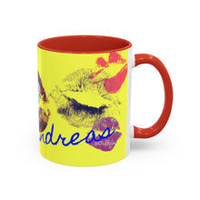 Load image into Gallery viewer, A microwave-safe ceramic mug, the Personalized Kiss Print Coffee Mug features a bright yellow body, red handle and interior, pop-art kiss prints, and blue cursive 'Andreas' on the front.
