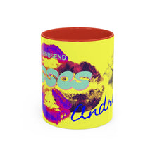 Load image into Gallery viewer, The Personalized Kiss Print Coffee Mug features a yellow exterior, red interior, colorful lipstick marks, “THOUSAND KISSES” in aqua, and “Andreas” in blue script. Dishwasher-safe for easy cleaning.
